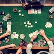 five people playing poker