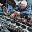 diesel mechanic working on an engine