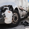 Volvo truck with crashed headlight