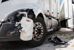 Volvo truck with crashed headlight