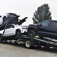 David Bunting's five-car Sun Country trailer loaded with pickup trucks