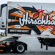 Hirschbach and Lineage Logistics Orange EV yard truck